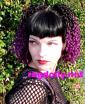 Photo above is shown in two hairpieces color black/purple tips.