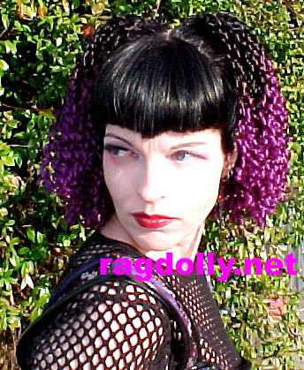 dark hair with purple tips. color black/purple tips.